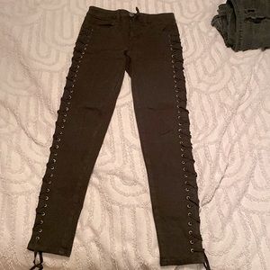 Black skinny Jean with ties up the side.4